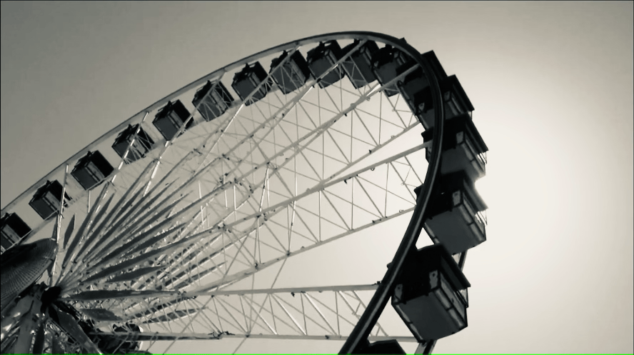 Grayscale GIF of a ferris wheel in motion